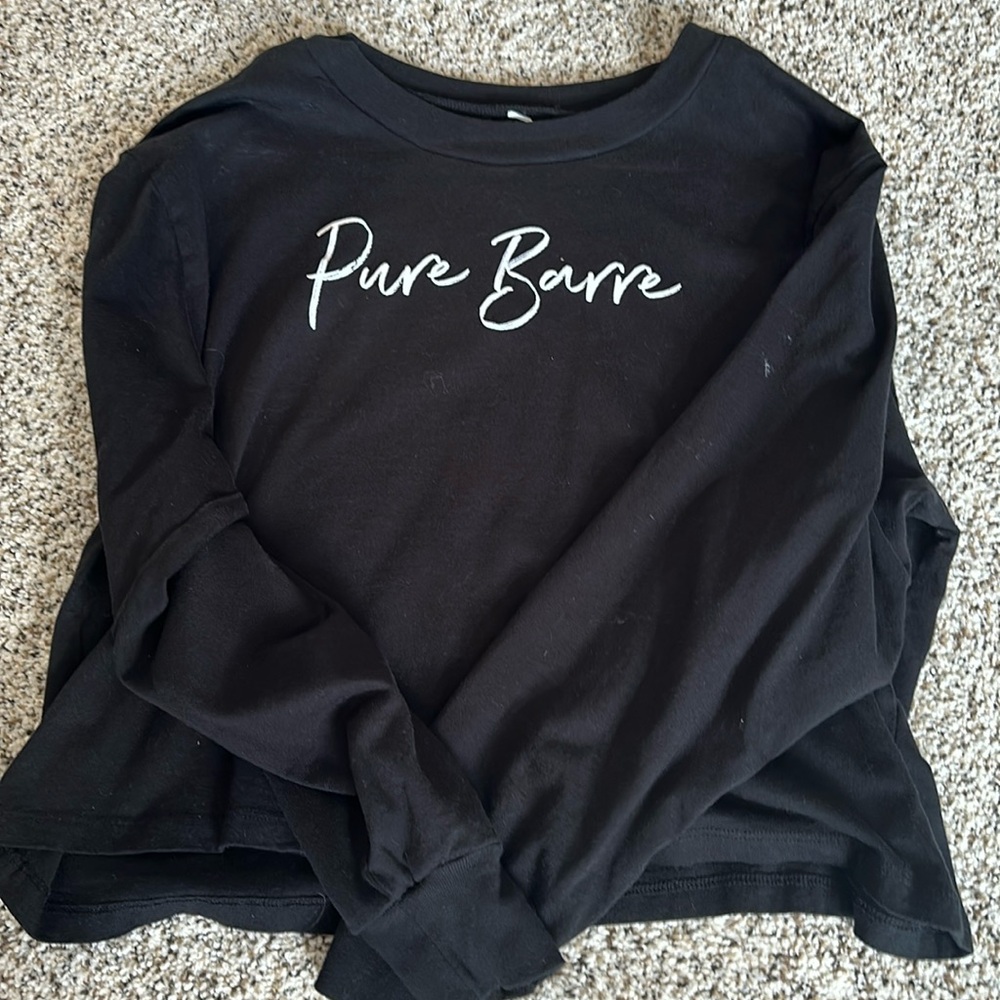 Long sleeved, cropped Pure Barre shirt.